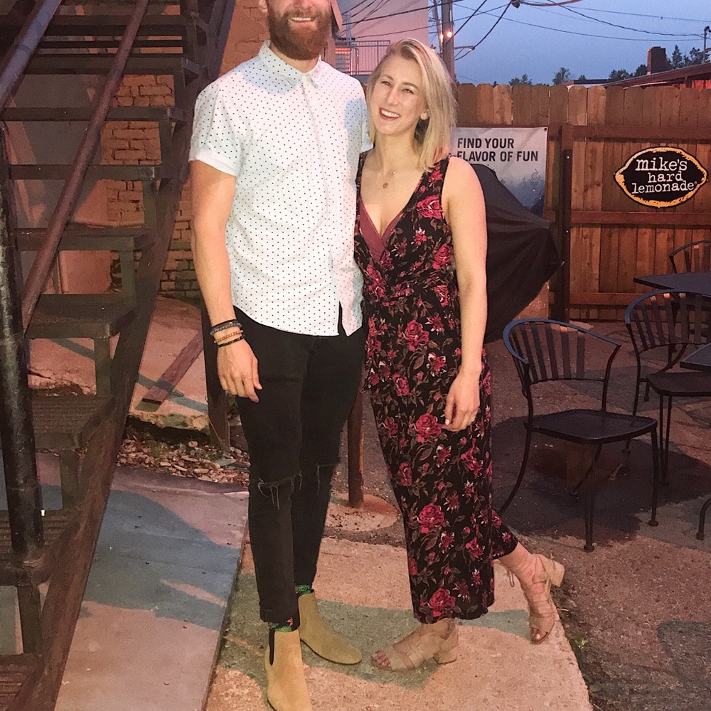 Out from under floral jumpsuit